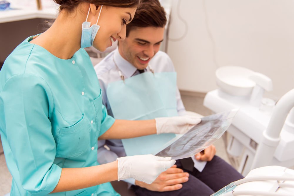 dental patient with dentist oral cancer screening